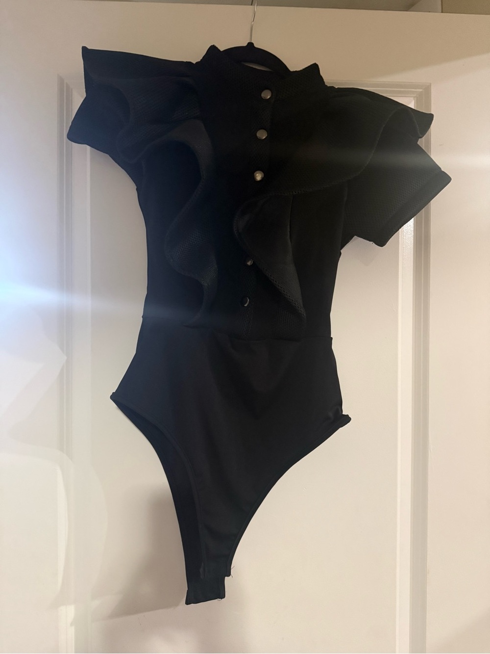 Black Ruffled One-Piece Bodysuit
